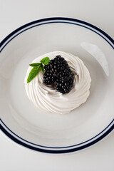 blackberry with meringue on a plate
