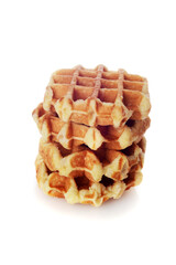 stack of belgian waffles on white