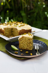 Lime and passionfruit cake in garden setting Portrait orientation beautifully decorated