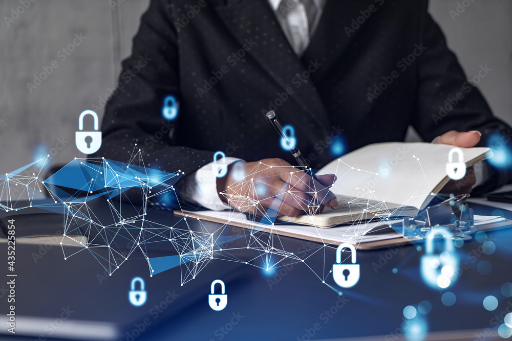 Aufkleber businesswoman is taking notes of clients needs to protect cyber security from hacker attacks and sav