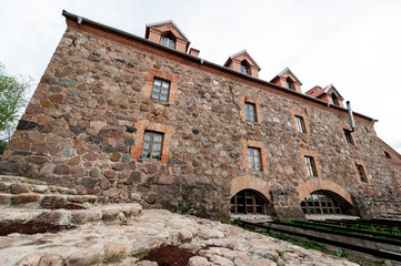 An old mill of the 19th century with a restoration in the village of Dvorishche