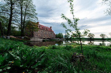 Old stone mill of the 19th century in the village of Dvorishche