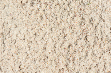 Sand with small stones. Summer background. Copy space 