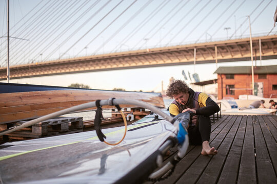 Windsurfer surfing on a windy day at the river.