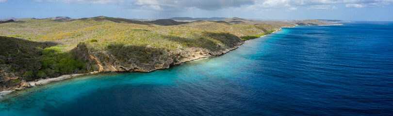 Aerial view above scenery of Curacao, Caribbean with ocean, coast and beach