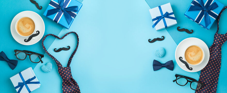Happy Fathers day concept with coffee cup,  necktie and gift box on blue background