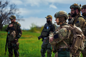 Group of military soldiers in uniform with weapons