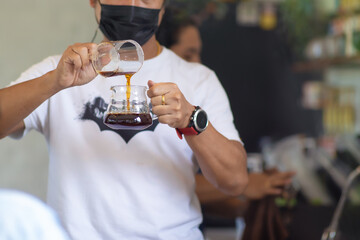 bartender pouring coffee