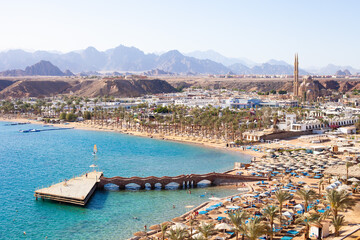 Sharm el-Sheikh, Sharm El Maya bay. Red sea and Sinai mountains on a background. Tours to Egypt, travel and tourism concept.