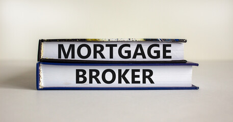 Mortgage broker symbol. Concept words 'Mortgage broker' on books on a beautiful white background. Business, mortgage broker concept.
