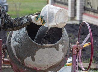 Concrete mixer for mixing sand with cement