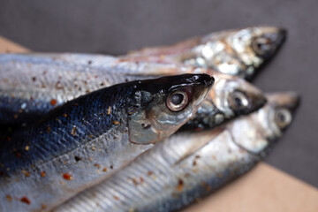 river fish in spices close-up. salted fish for the dish