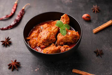 Spicy red chicken curry. Goan style chicken vindaloo. Butter chicken Murgh Makhani curry roast hot...