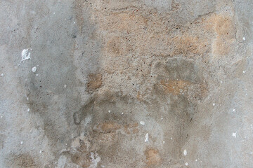 Old cracked weathered shabby plastered peeled wall texture background