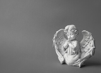Little guardian angel white wings. Mourning, sorrow, sadness