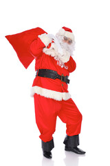 Santa Claus carrying big bag. Isolated on white background. Full length portrait