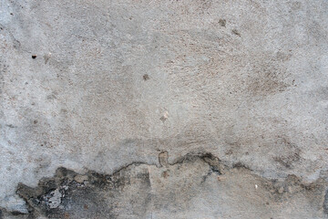Dark plaster wall with dirty cracked scratched background. Old retro vintage brickwall with peel grey stucco texture