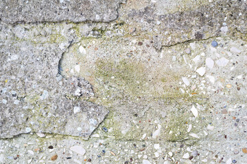 concrete wall marked by time