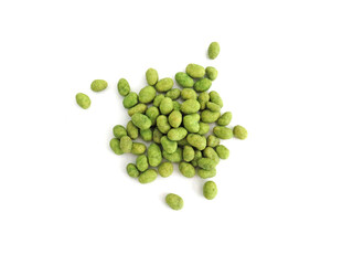 Peanuts (with Wasabi flavor) isolated on white background. Close up of Wasabi peanuts. Heap of wasabi coated peanuts. Green peanut baked salt and wasabi for snack. Oriental food. - obrazy, fototapety, plakaty