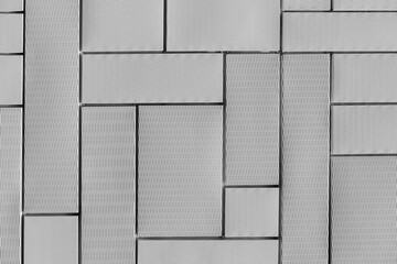 The texture of the tree. Black and white photo, texture, pattern. Wooden background. An abstraction of irregular tiles and lines.
