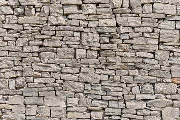 Foto op Canvas Background of stone wall texture. © Alejandro