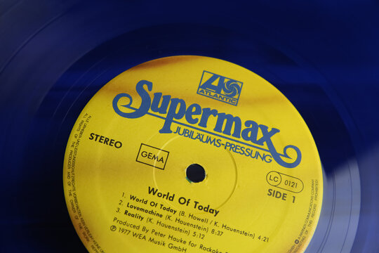 Viersen, Germany - May 9. 2021: Closeup of isolated supermax band blue vinyl record with yellow label
