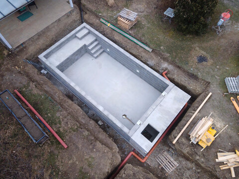 Drone photo of pool construction site in a garden in austria