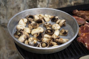 Fresh mushrooms prepared for grilling.