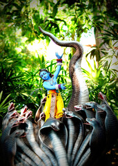 Lord Krishna on a huge snake