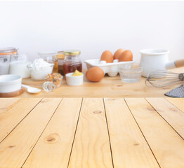 Cooking breakfast food or bakery with ingredient and copy space of wood table background.