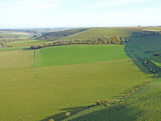 Paragliding above the fields at Monks Down in Wiltshire	