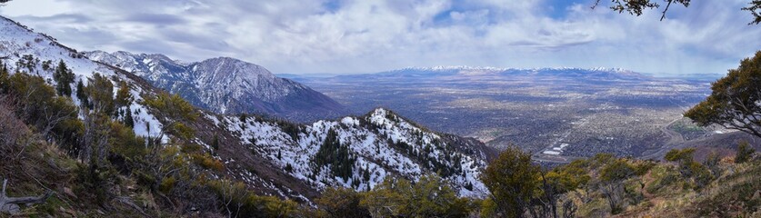 Fototapeta na wymiar Rocky Mountains landscape views from Grandeur Peak hiking trail, Bonneville Shoreline Pipe Line Overlook Rattlesnake Gulch trail, Wasatch Front, by Salt Lake City, Utah. United States. USA