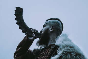 Brutal viking with horn