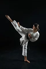 Fotobehang Male karate fighter, combat stance in action © Nomad_Soul
