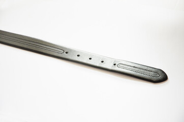 black leather belt with buckle on white background
