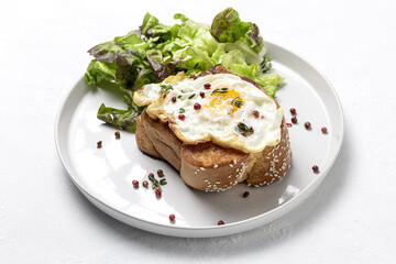 Homemade Fried Eggs with Brioche and Lettuce Salad