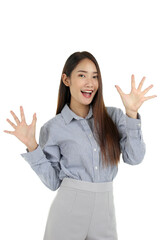 Portrait of happy smiling young beautiful Asian woman with long dark brown hair standing isolated on white background, surprised lady.