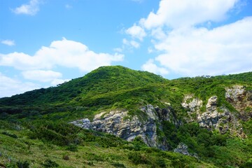 Fototapeta na wymiar Beautiful mountain view from Chishi observation deck in Zamami island, Okinawa, Japan - 日本 沖縄 座間味島 チシ展望台からの眺望 