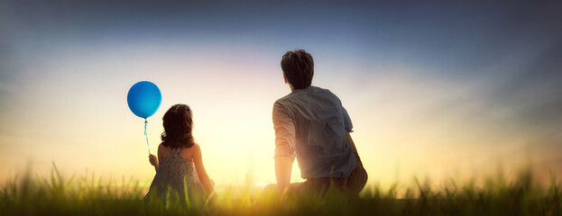 Father and his daughter outdoors