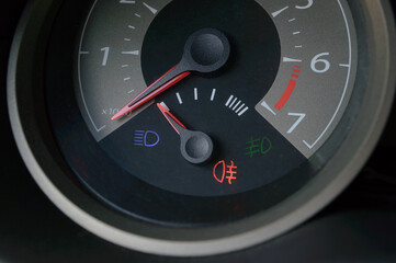 Car dashboard with different glowing indicators