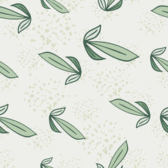 Green random seamless pattern with doodle leaf outline shapes. Grey background with splashes.