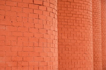 brick columns receding into the distance, perspective from a brick wall