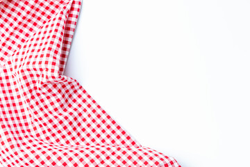 Abstract background fabric red and white placed on a white background top view, flat lay. Tablecloth checkers picnic for the weekend.
