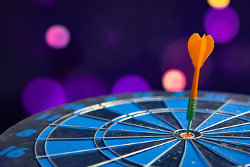 Fototapeta premium Bullseye is a target of business. Dart is an opportunity and Dartboard is the target and goal. So both of that represent a challenge in business marketing as concept.