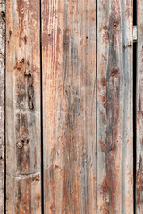 Old wooden background. Old shabby wood planks. A tattered dilapidated fence. Natural creative...