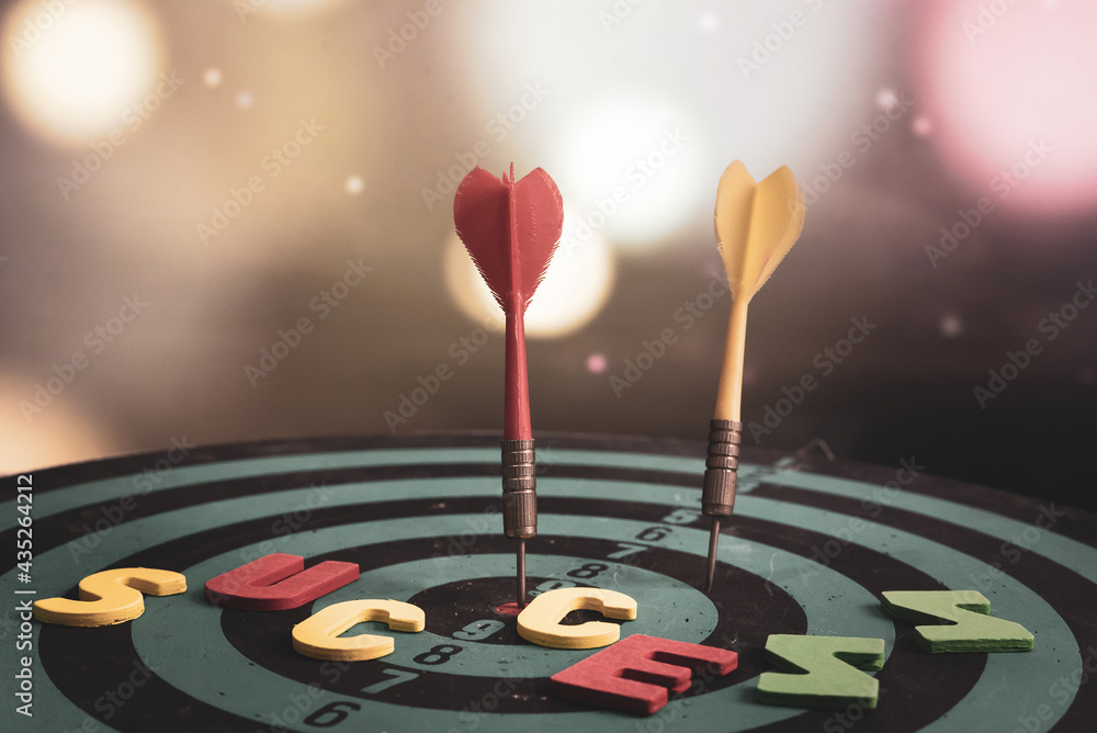 Poster bullseye is a target of business. dart is an opportunity and dartboard is the target and goal. so bo