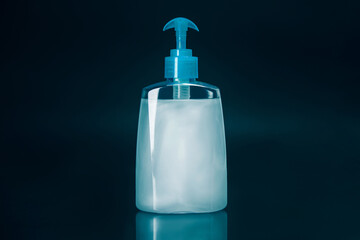 Hand sanitizer on a black background. photo with a copy-space.