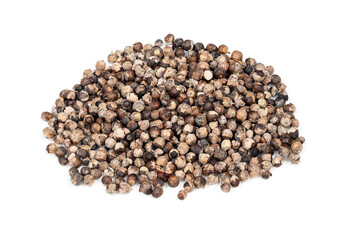 pile of monk's pepper (Vitex) closeup on white