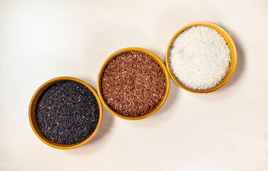 top view of black, red and white long-grain rice