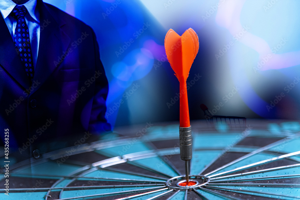 Poster bullseye is a target of business. dart is an opportunity and dartboard is the target and goal. so bo